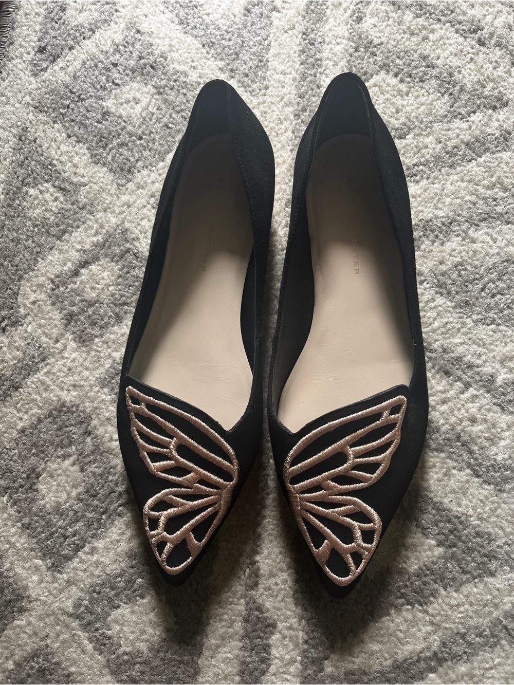 Sophia Webster Black Flats with Rose Gold Wing Embroidery